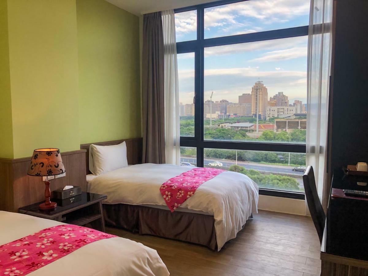 Sendale Zhubei Business Hotel Bagian luar foto